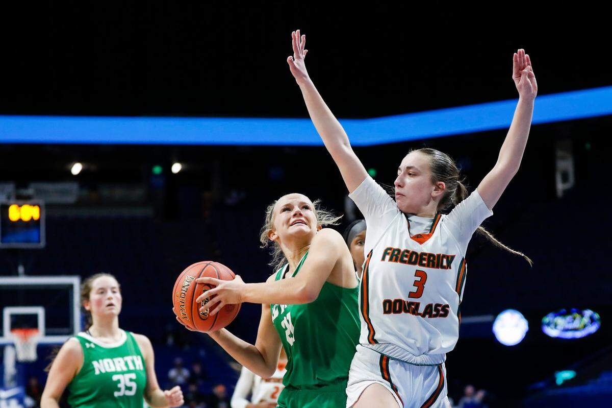 Kate Baker (3) is one of only three players on this season’s Frederick Douglass roster who played in the Sweet 16 the last time the Broncos qualified in 2023. However, Baker will have to sit this one out because of a knee injury she suffered late this season. In this photo, Baker is guarding Brooke Nichelson (21), who will be back in the state tournament again this season with North Laurel.