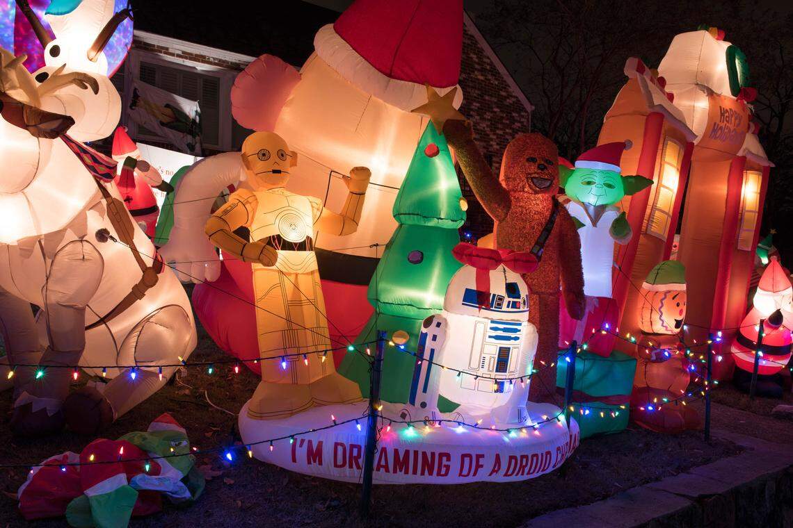 Nothing says Christmas like Chewbacca and R2D2, but have a Driod Christmas anyway! This house is chocked full of Star Wars characters along with Santa and a reindeer in a tub continuing to rub-a-dub-dub with an automatron motion. (It says trailer park but these blow ups are at a neighboring house.)