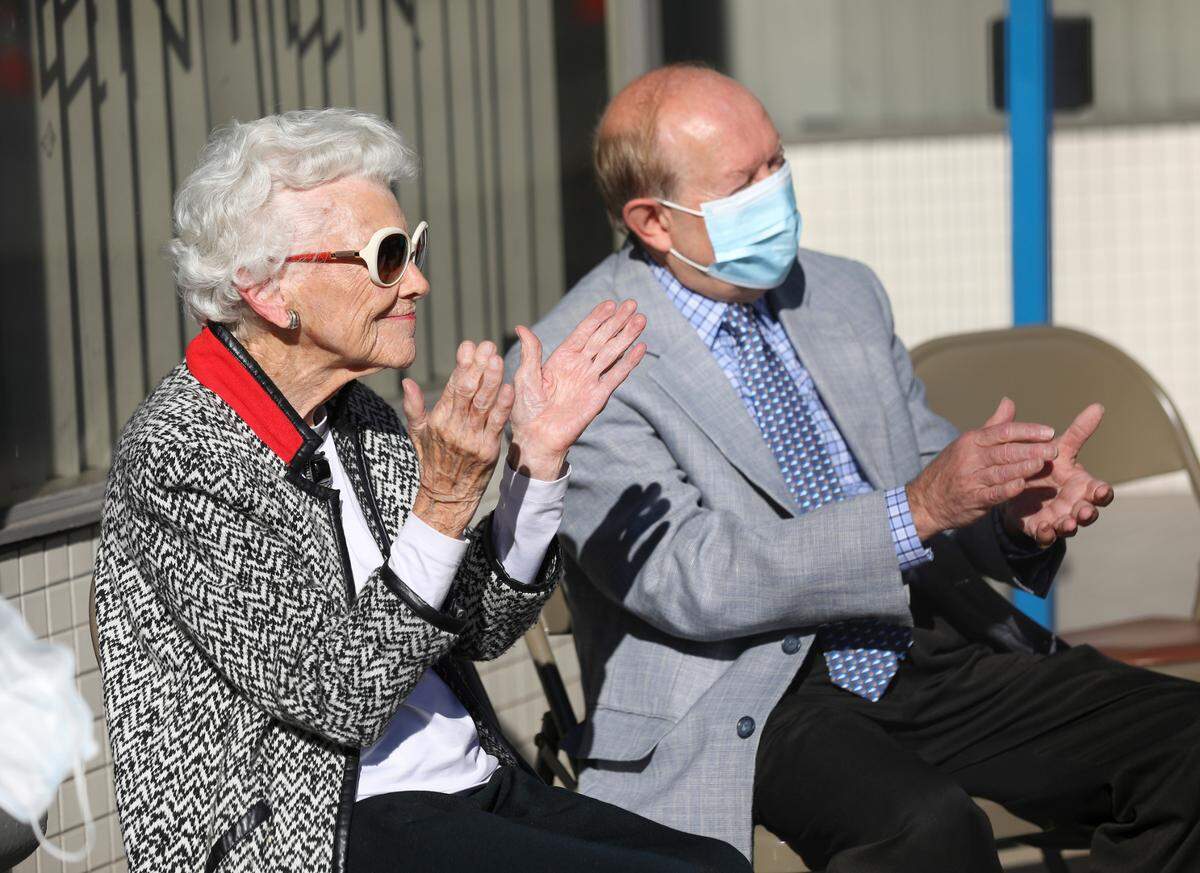 Former Vice Mayor Isabel Yates and Fred Mills, longtime manager of the Kentucky Theatre, react to the announcement that the Friends of the Kentucky Theatre have been selected as the new management company of the theater on Sept 24, 2021. Mills will return to run the movie house.
