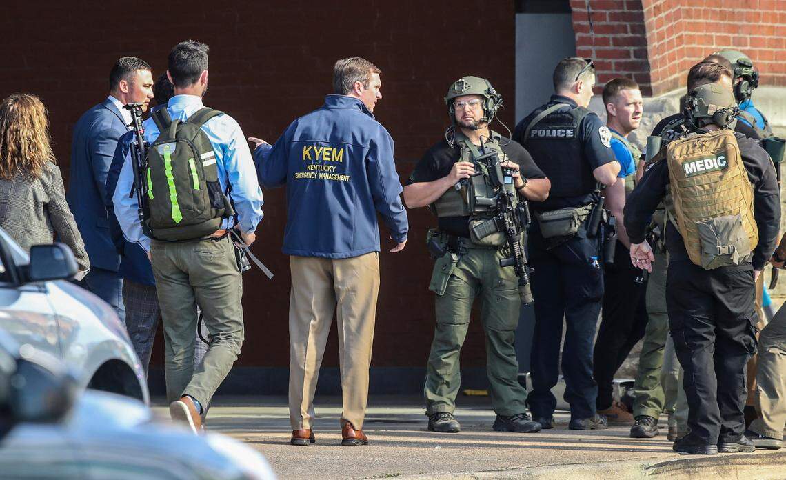 Kentucky Gov. Andy Beshear arrives at the scene of a shooting in Louisville, Ky., Monday, April 10, 2023. (Michael Clevenger/Courier Journal via AP)