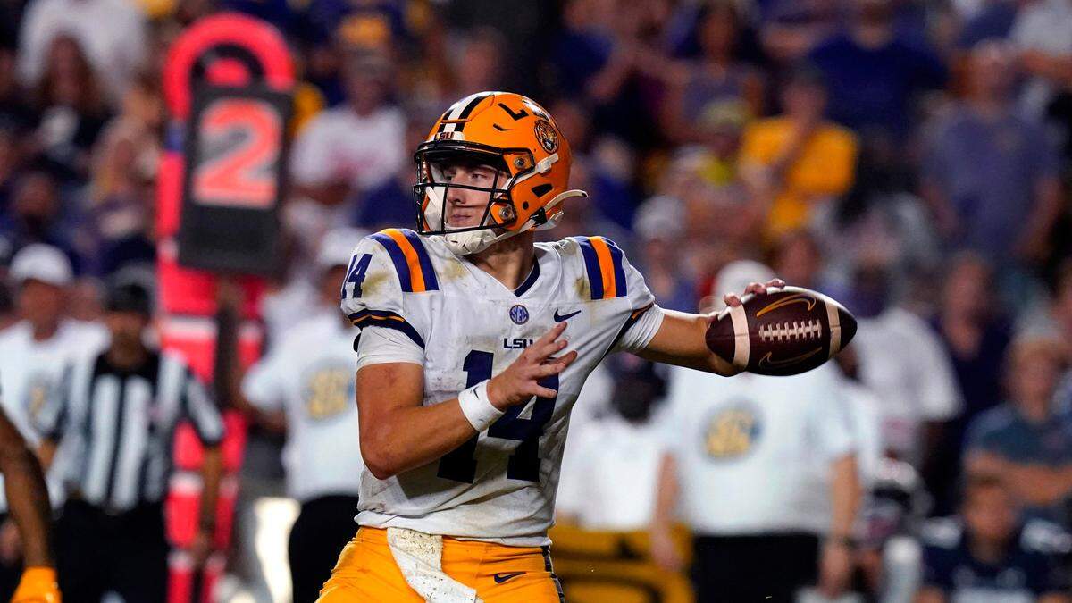 LSU quarterback Max Johnson (14) is the son of former NFL QB Brad Johnson and the nephew of ex-Georgia and Miami Coach Mark Richt.