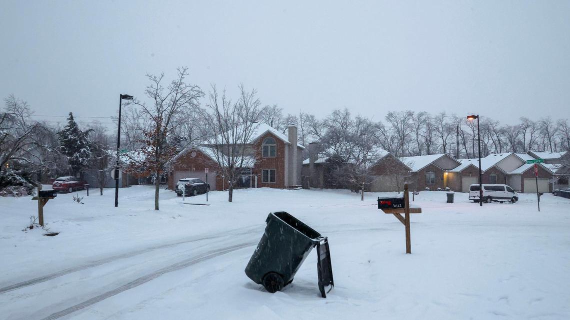 A Herbie trash receptacle sits on Iron Lace Drive Friday, Jan. 10, 2025 in Lexington, Ky. Snowfall hit Lexington after a week of snow and ice.