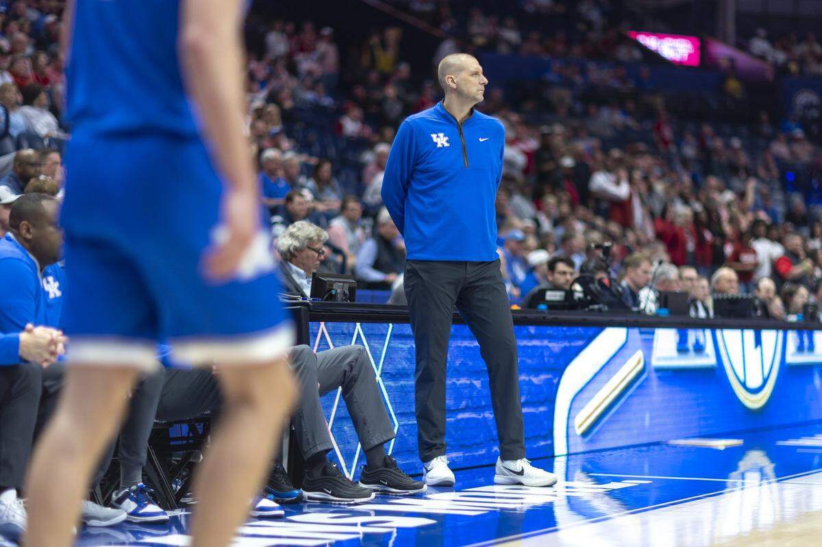 Kentucky head coach Mark Pope watches his team play against Alabama in the SEC Tournament quarterfinals at Bridgestone Arena in Nashville, Tennessee.