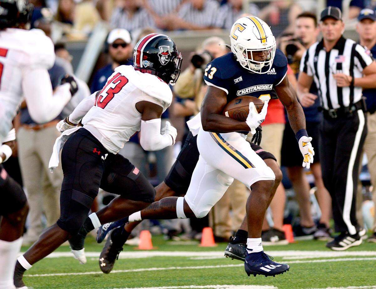 Chattanooga running Tyrell Price (23) carried the ball eight times for 41 yards in the Mocs’ 30-20, season-opening loss to Austin Peay.