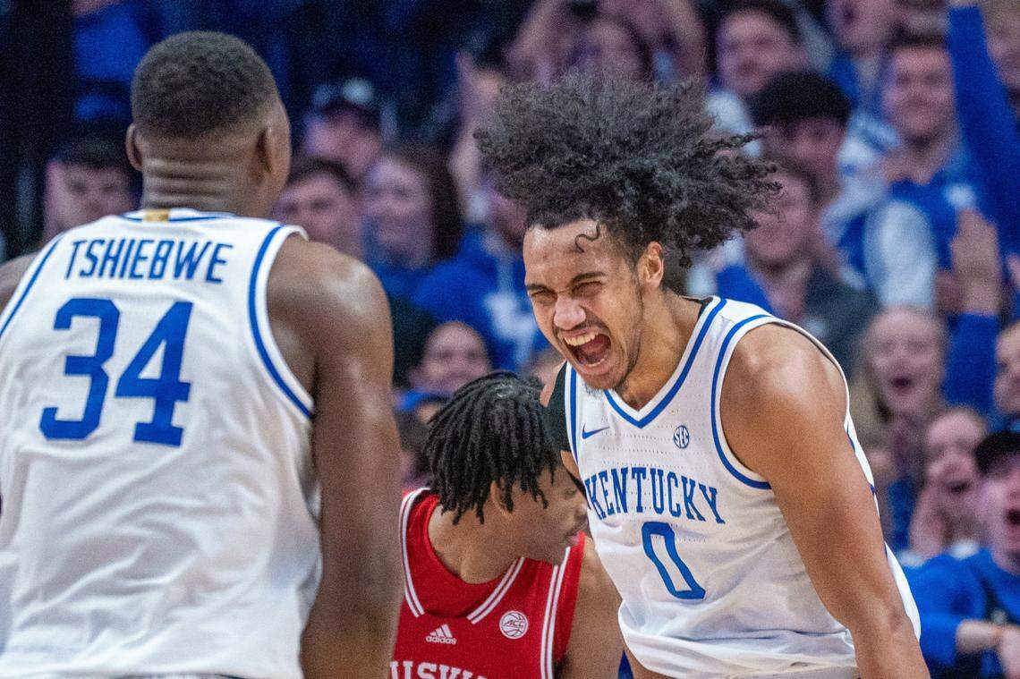 Kentucky forward Jacob Toppin (0) reacts to a dunk as UK defeated Louisville 86-63 at Rupp Arena on Saturday.