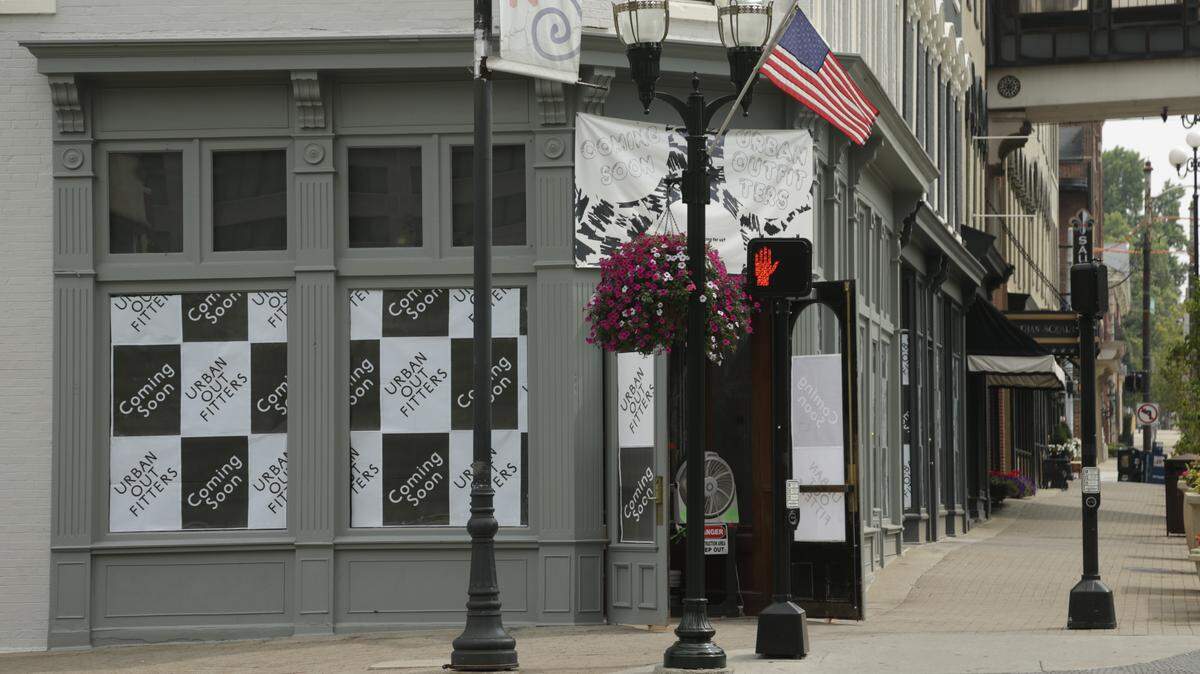 The former DeSha's on Main and Broadway has signs reading "Urban Outfitters" and "Coming Soon"  in Lexington, Ky., on Aug. 5, 2014.  Photo by Pablo Alcala | Staff