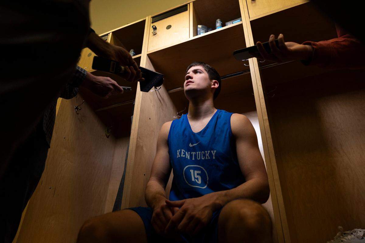 Kentucky guard Reed Sheppard talks with reporters in the locker room before his final game as a Wildcat.