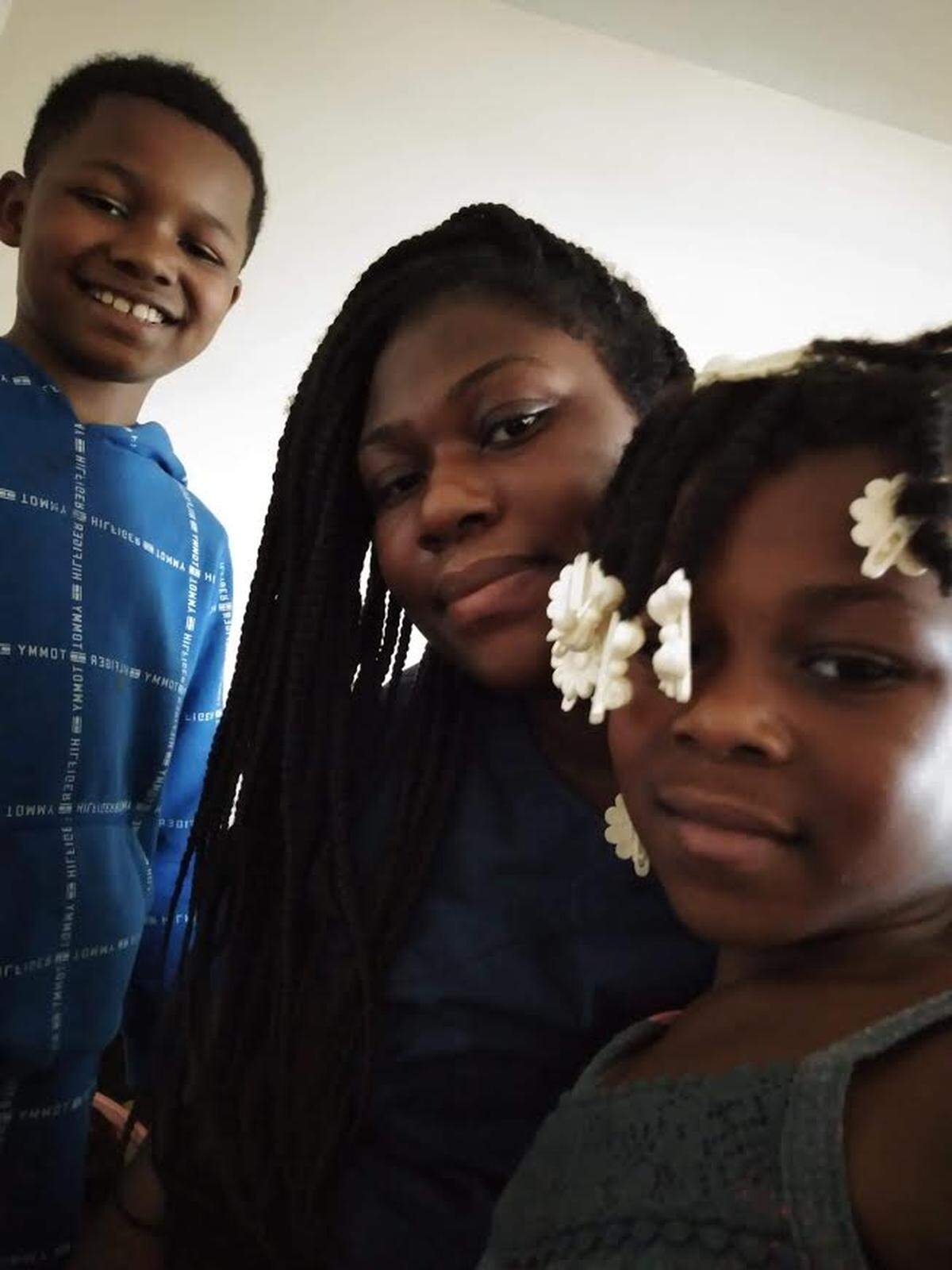 Tricia Holliday said her children Marvin Holliday, left and Serenity Holliday haven’t been able join in virtual Fayette County Public Schools classes days into the school year because a hot spot mobile device was not available until Friday.