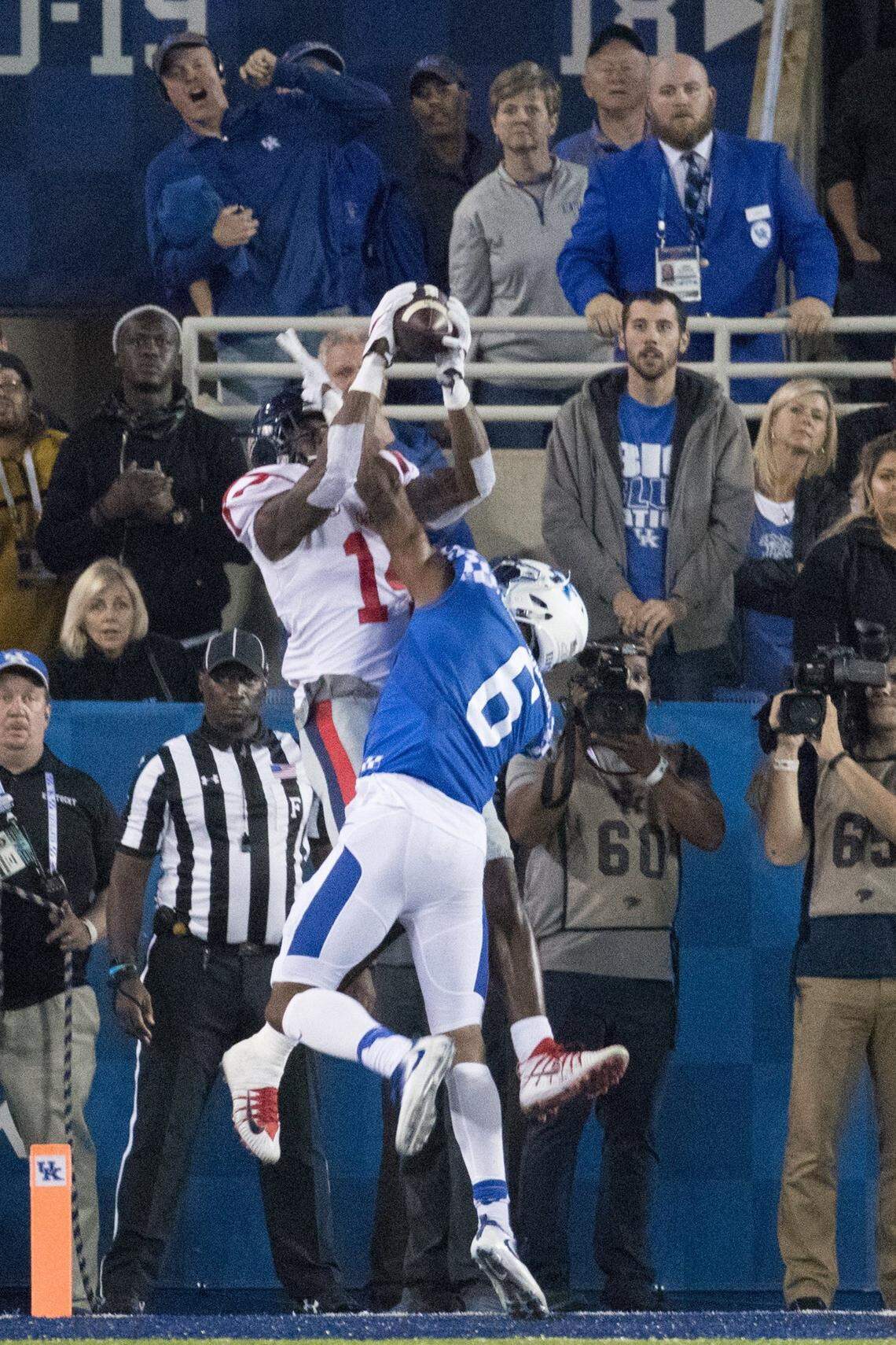 Ole Miss wideout D.K. Metcalf leaps above Kentucky cornerback Lonnie Johnson to snare the game-winning touchdown with five seconds left in a 37-34 win against UK at Kroger Field in 2017.