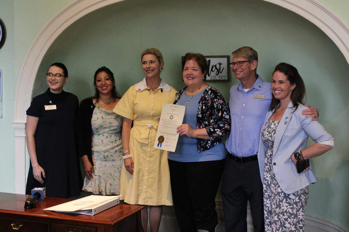 Britainy Beshear, The Nest and Prevent Child Abuse Kentucky executives pose for a photo after Beshear’s proclamation on June 5, 2024, at The Nest in Lexington, Kentucky.