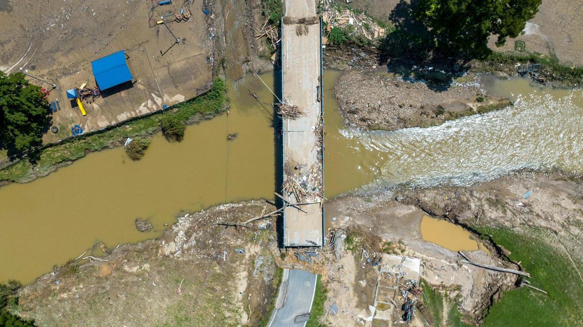 A bridge along KY-3351 over Troublesome Creek near Ary in Perry County, Ky., remains damaged Tuesday, Aug. 2, 2022, following flooding last week that devastated many counties in Eastern Kentucky.