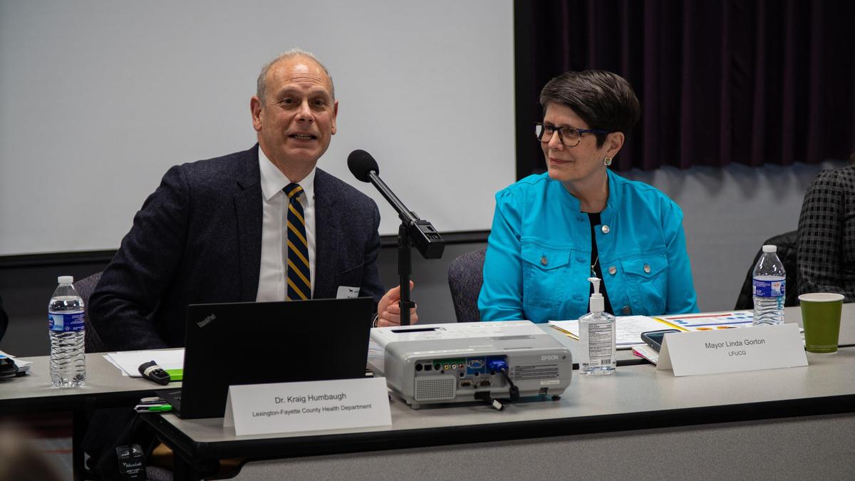 Dr. Kraig Humbaugh, left, Lexington-Fayette Commissioner of Health, joins with Mayor Linda Gorton, right, on March 3, 2020, to speak to the city’s stakeholders on preparedness of COVID-19.