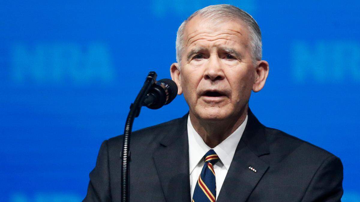 In this May 4, 2018 photo, former U.S. Marine Lt. Col. Oliver North speaks before giving the Invocation at the National Rifle Association-Institute for Legislative Action Leadership Forum in Dallas. The NRA announced that North would become President of the National Rifle Association of America within a few weeks. (AP Photo/Sue Ogrocki)