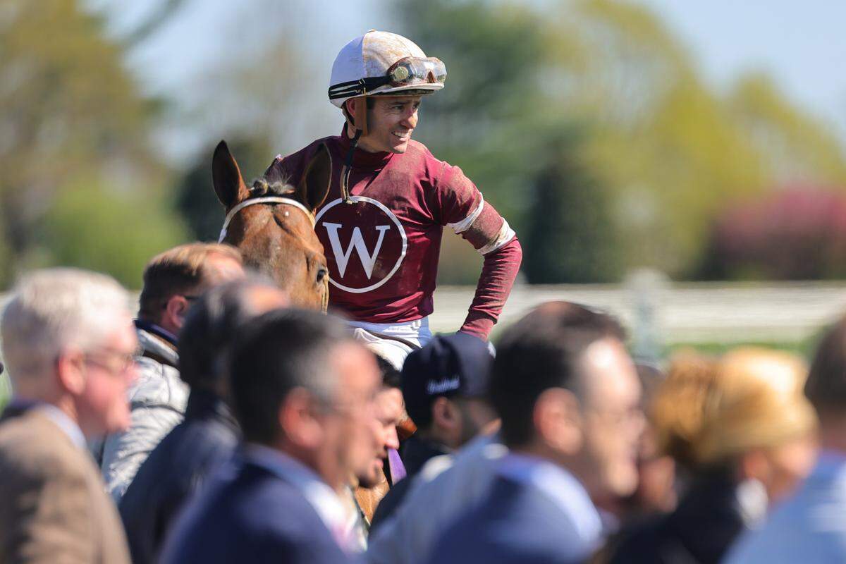Flavien Prat, aboard Extra Anejo, celebrates after winning the Grade 3, $350,000 Commonwealth on Tuesday.