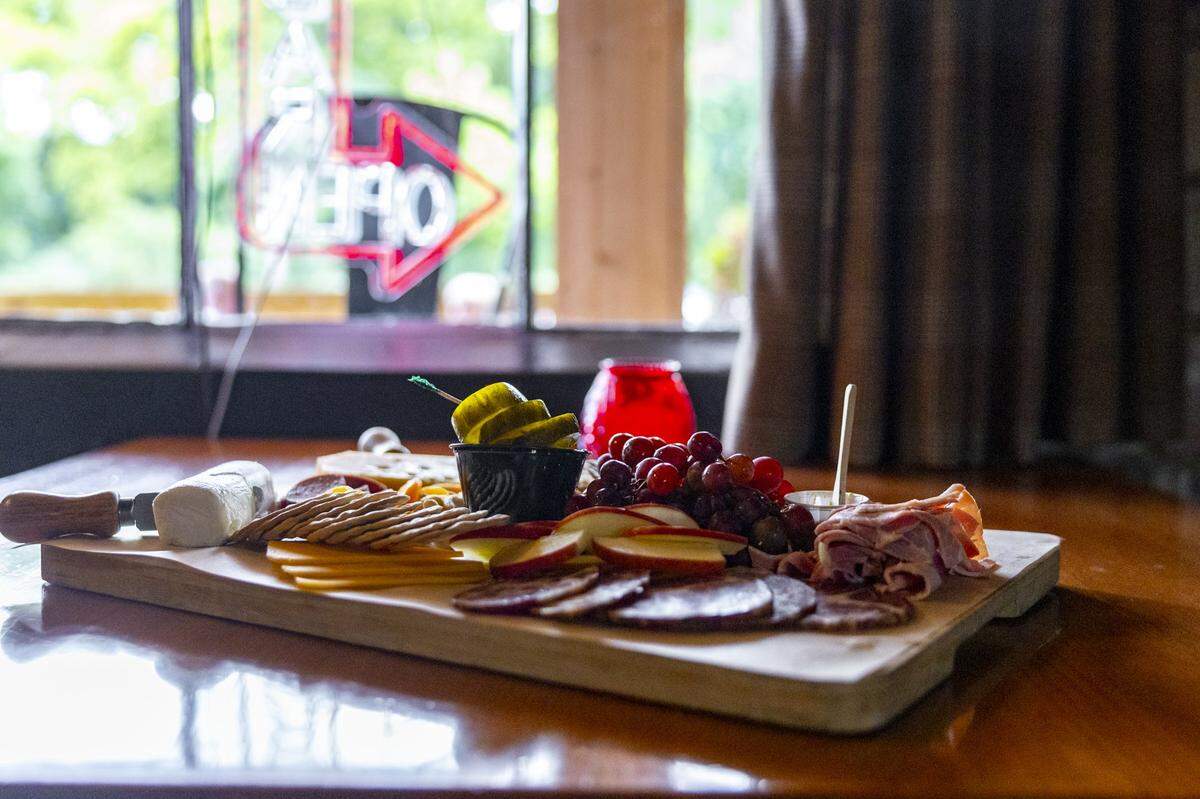 The distiller's board includes meats, cheeses, fruits, nuts, pickles and crackers at the Elkhorn Tavern in the Distillery District in Lexington, Ky.
