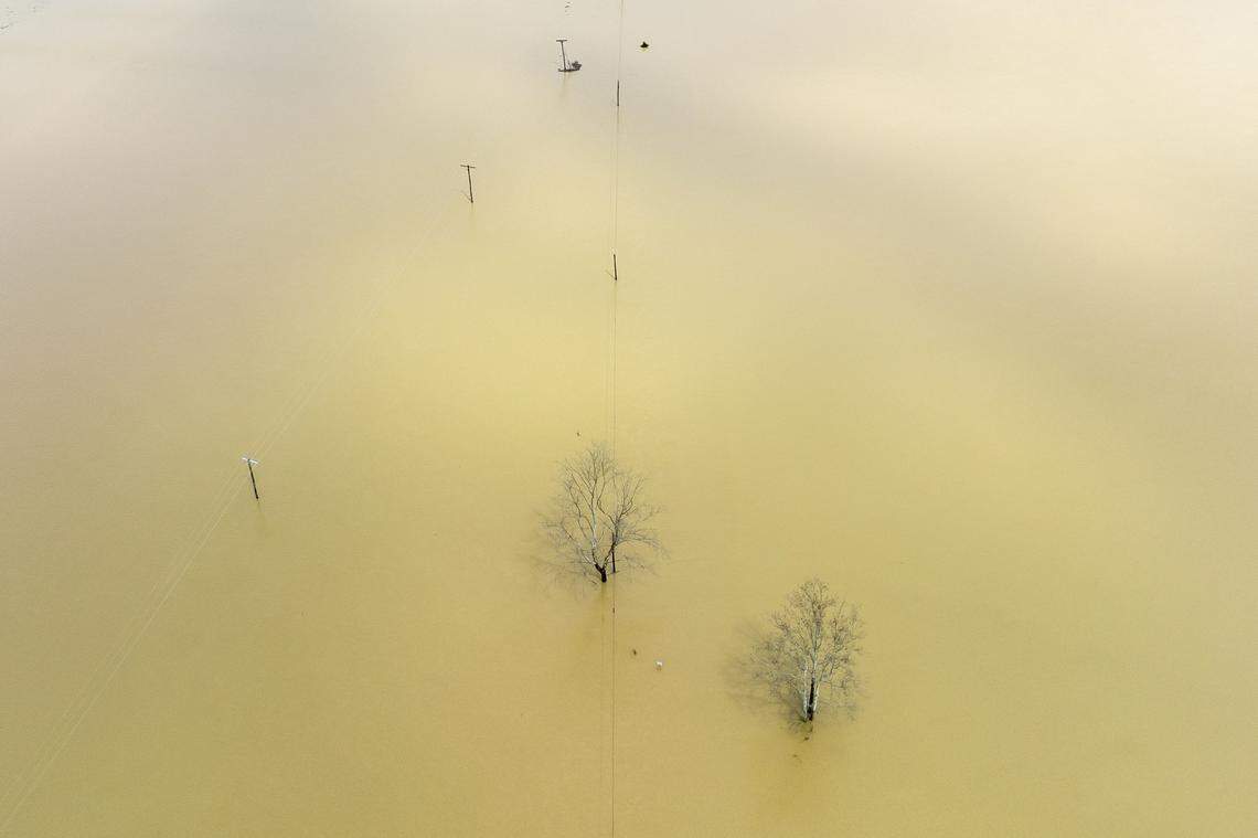 Water floods Kentucky Route 39 near Crab Orchard in Lincoln County, Ky., on Friday, April 4, 2025.
