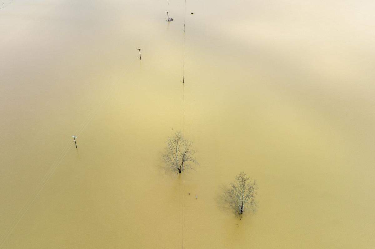 Water floods Kentucky Route 39 near Crab Orchard in Lincoln County, Ky., on Friday, April 4, 2025.