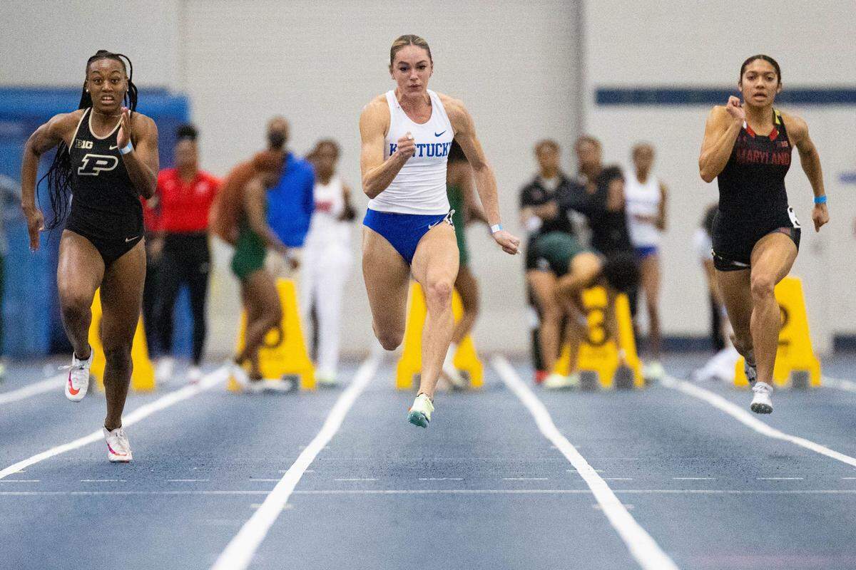 Abby Steiner, center, wins the 60-meter dash during the Rod McCravy Memorial indoor track and field meet at UK last month. Steiner, a senior, has set two collegiate records this indoor season.
