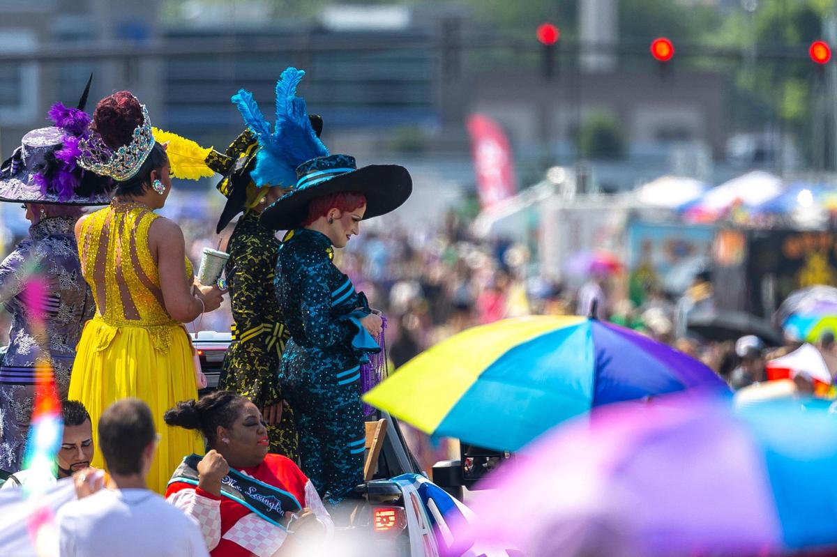 Kristin Mingle, with blue feathers in hat, the outgoing Miss Lexington Pride, was a grand marshal for the first ever Lexington Pride Festival Parade Powered by VisitLEX at the Lexington Pride Festival on Saturday, June 28, 2025.