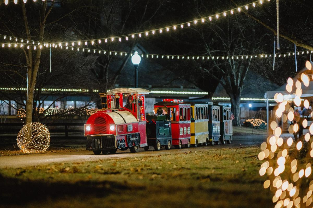 Kids can ride a mini train in the Holiday Village at the Southern Lights Holiday Festival in Lexington, Ky. At the Kentucky Horse Park. The Holiday Village is at the end of the driving tour and is included with admission.