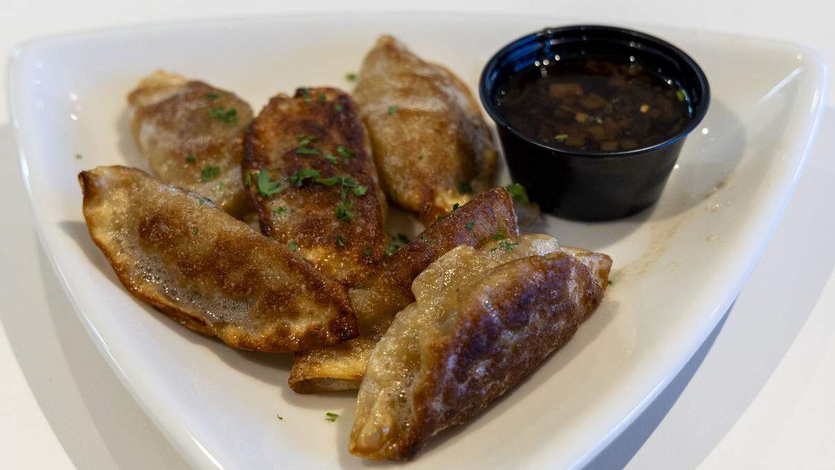 The Potsticker appetizer ($7.50) at Nothing But Noodles is made with teriyaki chicken and comes with a zesty soy lime sauce. 