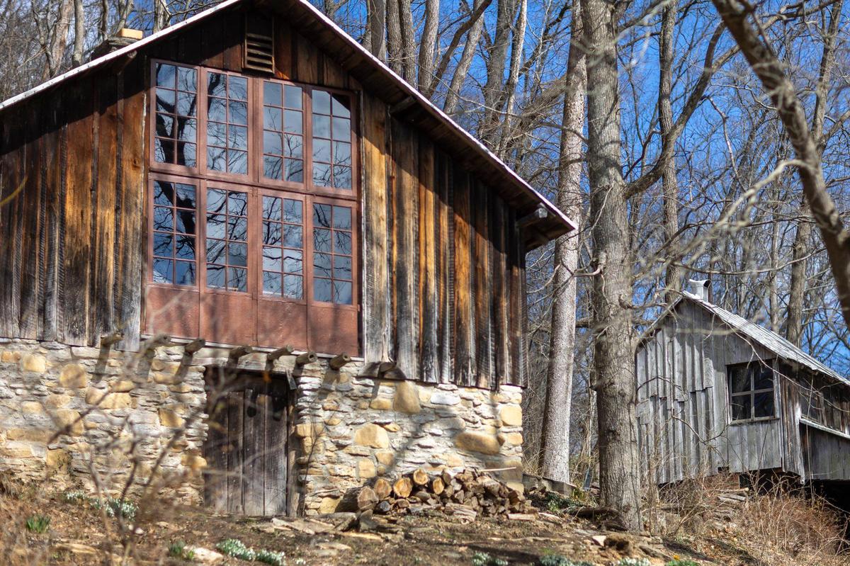 The residence, left, and studio at Payne Hollow are photographed in Trimble County, Ky., on Thursday, March 6, 2025. Harlan and Anna Hubbard lived off their land in a very remote and sustainable way for about 40 years at Payne Hollow.