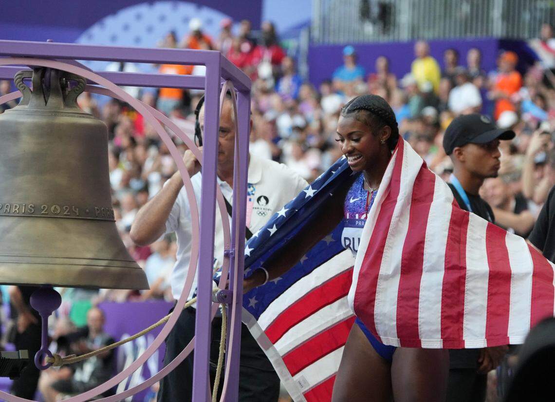 Aug 10, 2024; Saint-Denis, FRANCE;  Masai Russell (USA) celebrates winning the women's 100m hurdles final during the Paris 2024 Olympic Summer Games at Stade de France. Mandatory Credit: Kirby Lee-USA TODAY Sports