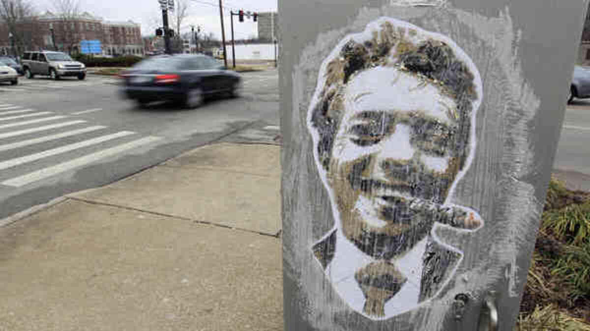 Large stickers of Gatewood Galbraith have been placed on many traffic signal boxes around town.