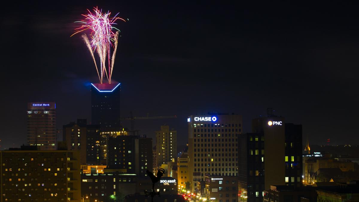 The Fourth of July fireworks display shot off of the 31-story, 410-foot Lexington Financial Center seen from The Woodlands Wednesday in Lexington.
