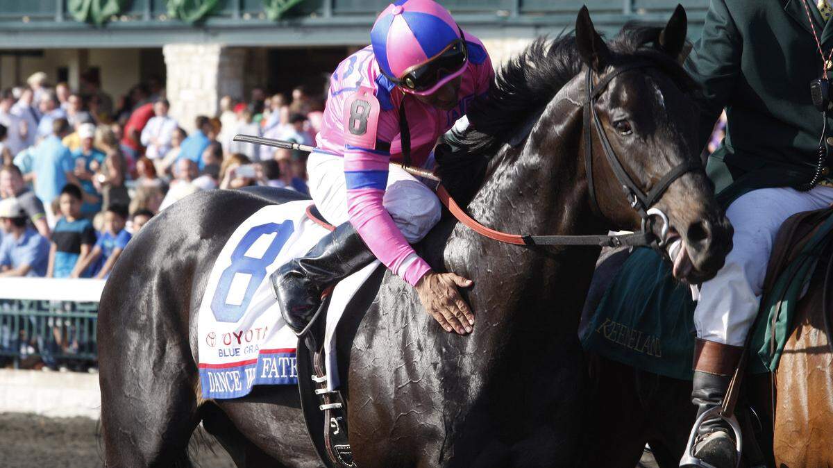 Jockey Corey Nakatani patted Dance With Fate after they teamed up for the win in the Grade I Toyota Blue Grass Stakes last Saturday at Keeneland. Nakatani will keep the mount for the Kentucky Derby.