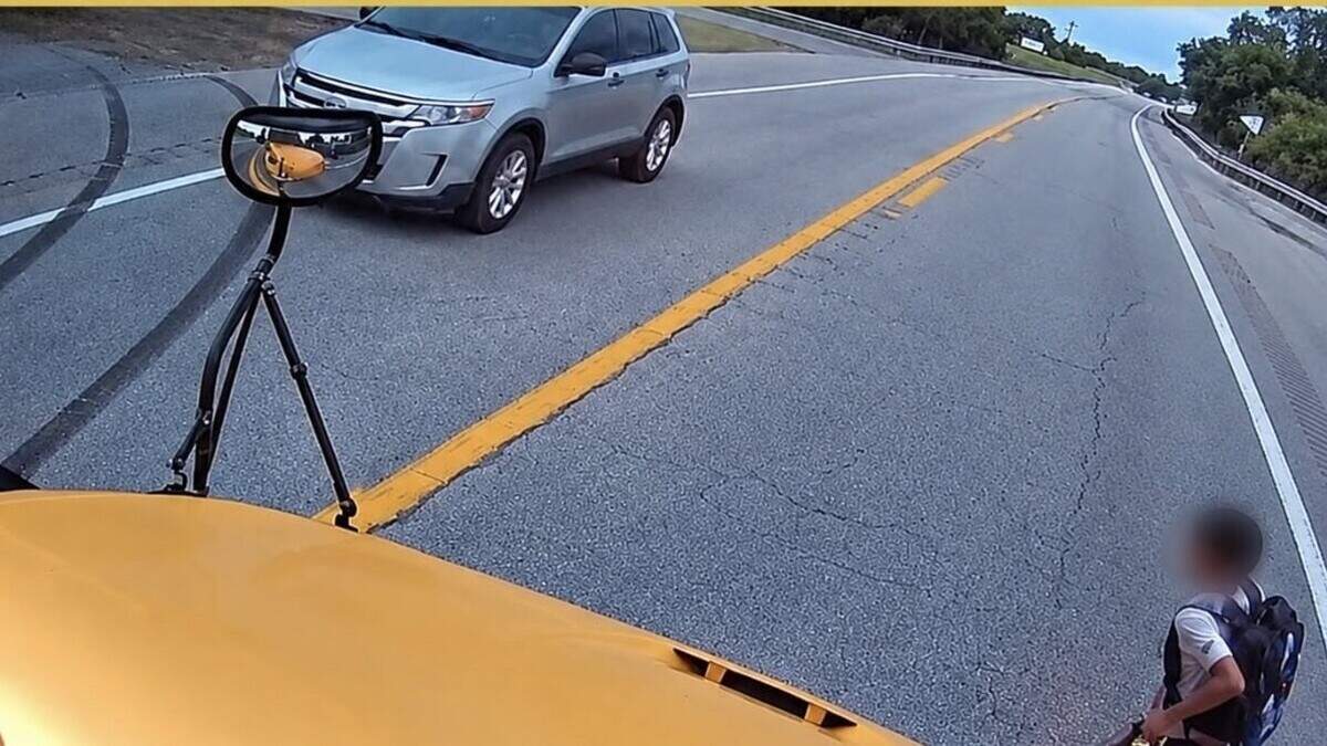 Kentucky woman charged after nearly hitting child near stopped school bus