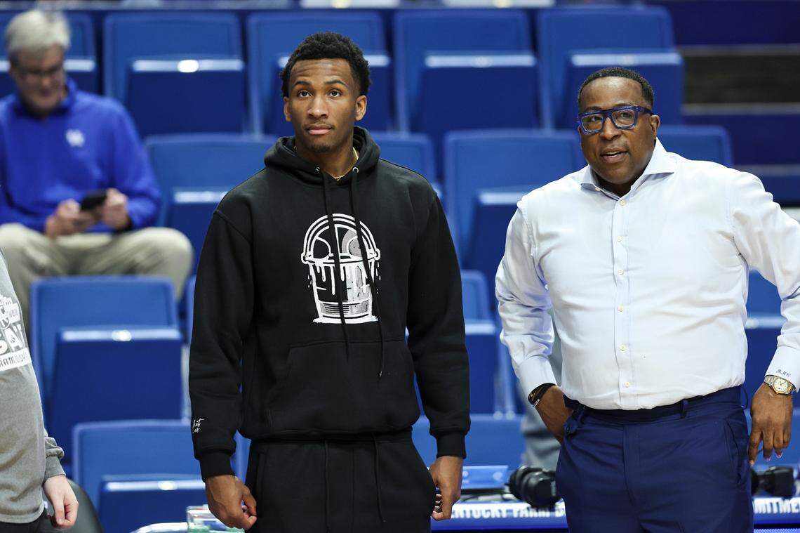 Class of 2025 college basketball recruit Darryn Peterson (left) talks with Kentucky men’s basketball assistant coach Chin Coleman prior to UK’s home game against Vanderbilt at Rupp Arena in Lexington, Ky, Wednesday, March 6, 2024. Peterson is taking his first official visit to the Wildcats.