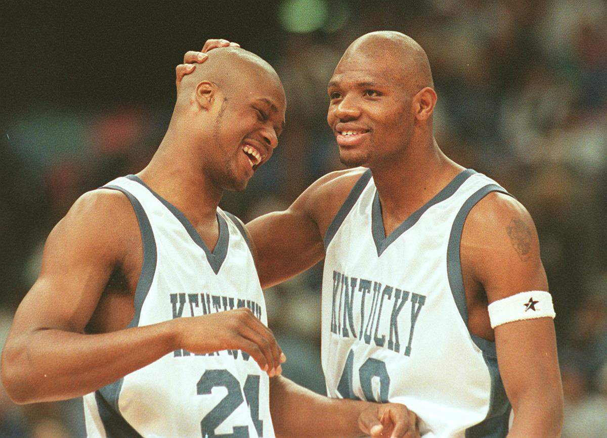 Word broke on the Friday night before the 1996 Kentucky Derby that Antoine Walker, left, was considering leaving Kentucky to turn pro.
