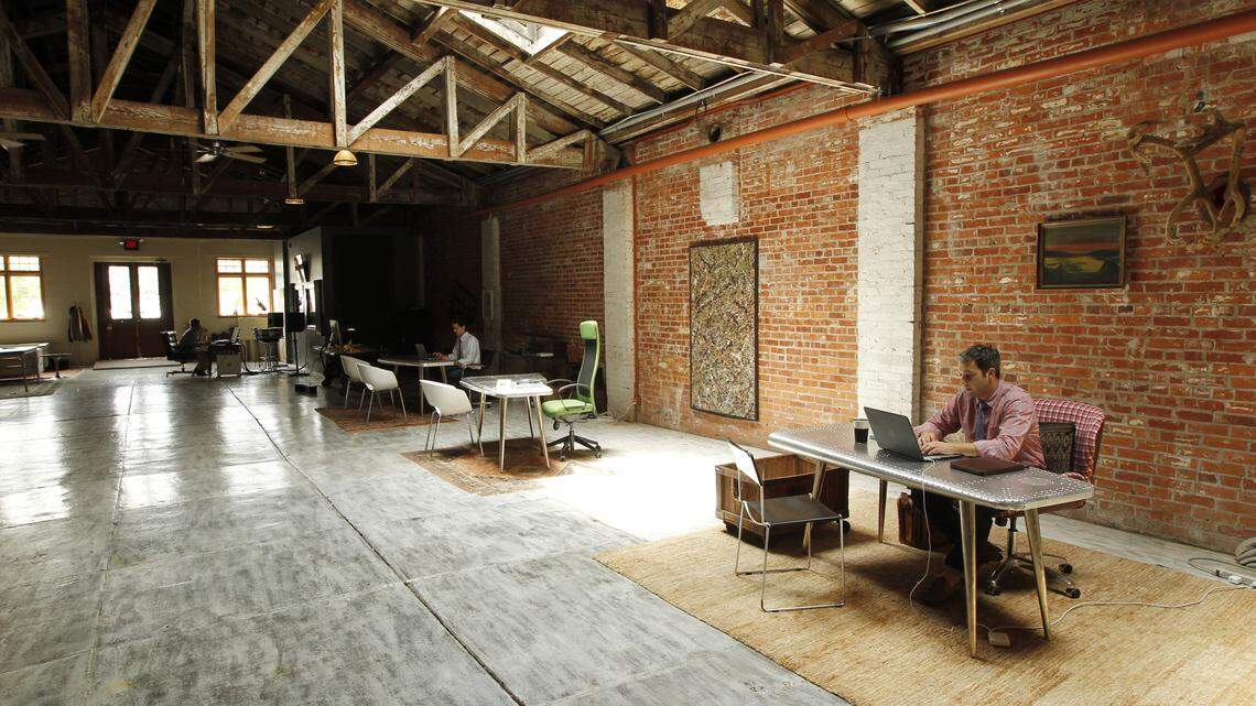 Bo Harris in the office of Harris and Ward in the old Lexington Livery building in Lexington, Ky., on May 31, 2013. Photo by Pablo Alcala | Staff 