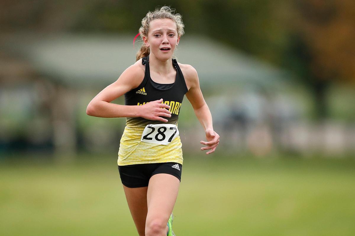 Woodford County’s Addison Moore neared the finish line during the Class 3A Region 6 cross country meet at Lykins Park in Winchester. Moore won the girls’ title with a time of 18:43.70.
