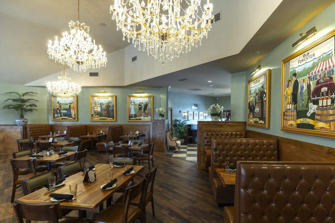 The dining room offers custom murals and chandeliers at Carson’s new location at 3450 Todds Road in Lexington, Ky., on Friday, June 21, 2024.