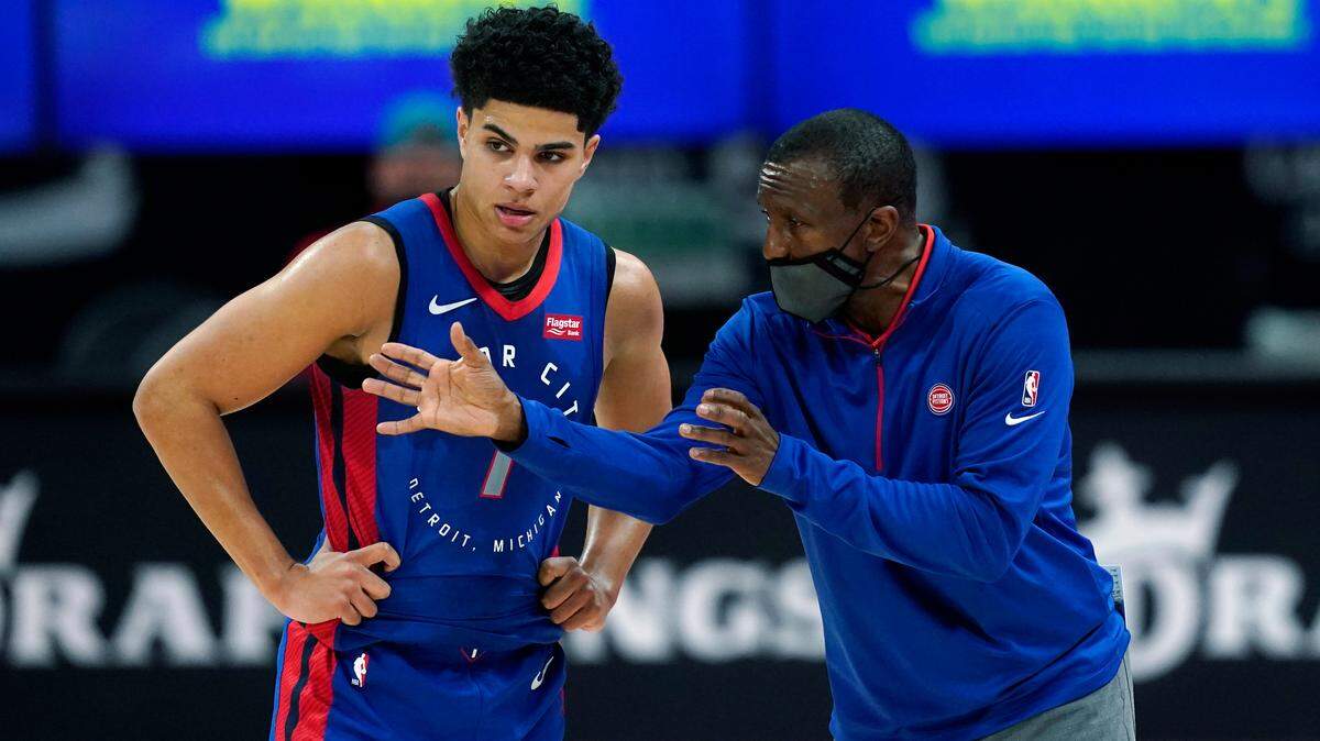Detroit head coach Dwane Casey talks with guard Killian Hayes during a game in April. Casey, a former UK player and assistant coach, recently signed a contract extension with the Pistons.