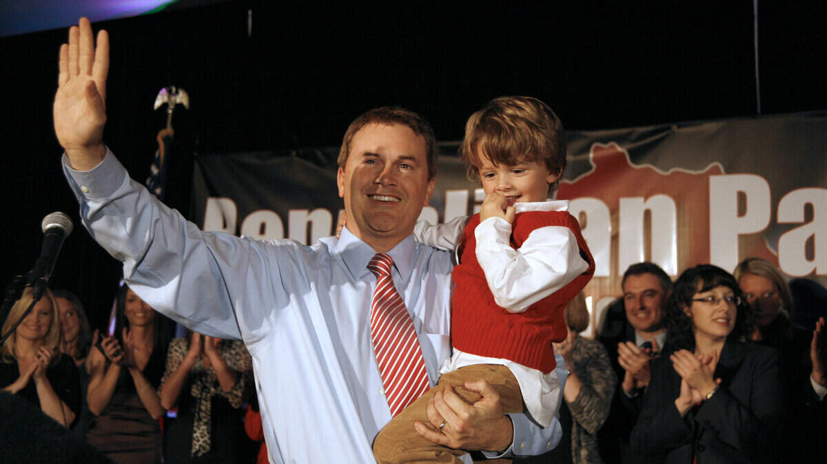 After his  victory speech Tuesday night in Lexington, Republican James Comer waved to  supporters as he held son Harlan, 4. Comer will succeed Richie Farmer as agriculture commissioner.   