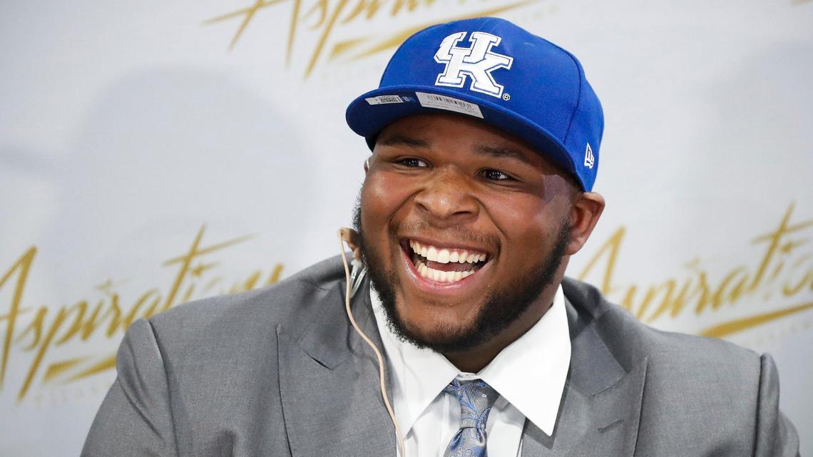 Offensive tackle Kiyaunta Goodwin a reacts after committing to the University of Kentucky at Aspirations Fitness Institution in Louisville, Ky., Saturday, April, 17, 2021.