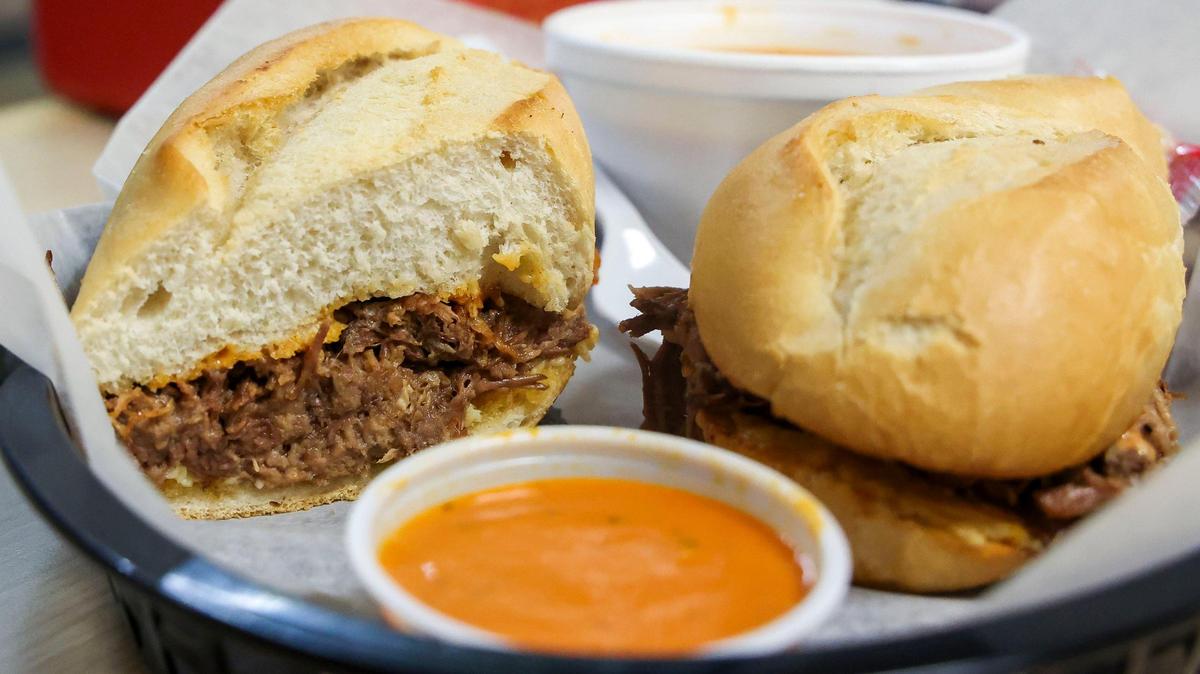 The Asiago pot roast sandwich ($8.95) at Dad’s Favorites Deli, Thursday, June 26, 2025, in Lexington, Ky. is served on a French roll with roasted red pepper sauce.