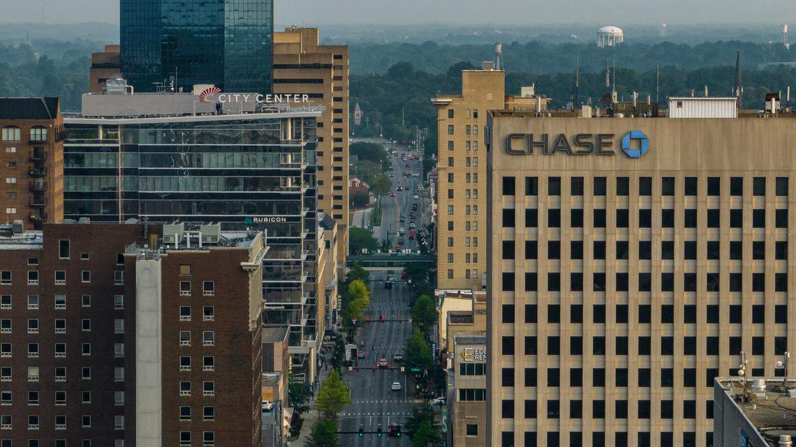Vehicles drive along Main Street in downtown Lexington, Ky., on Thursday, June 15, 2023.