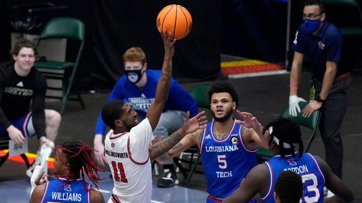 Western Kentucky guard Taveion Hollingsworth (11) went up for a shot against Louisiana Tech in the quarterfinals of the NIT on March 25 in Frisco, Texas.