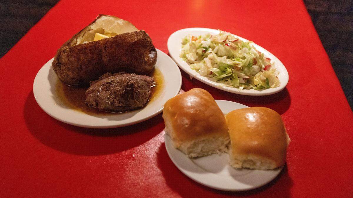 The Nighthawk Special, a tenderloin steak with the Diego Salad and rolls at Columbia Steakhouse on North Limestone.