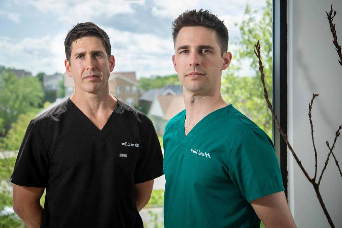 CEO and co-founder Dr. Matt Dawson poses for a portrait with Dr. Luke Murray, who oversees the Wild Health COVID testing operations at Wild Health’s office in Lexington, Ky., Sunday, May 2, 2021. “The mission of Wild Health is to optimize our patients health and health span and right now, in the pandemic, the best way we can meet that need is with testing and vaccination,” Dr. Dawson said.