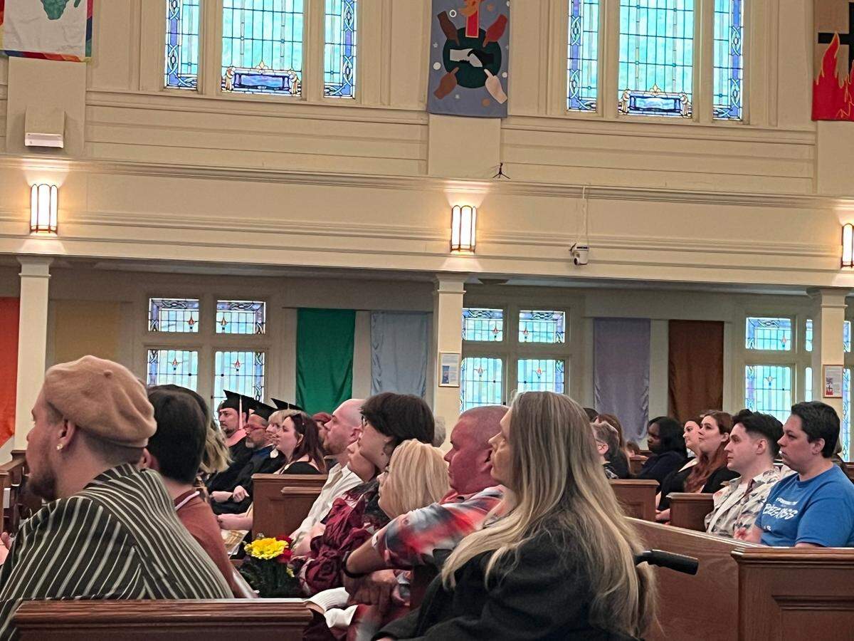 Families, UK employees, and Lexington community members filled the pews at Maxwell Presbyterian Church for a special Community Commencement after UK canceled special ceremonies because of new DEI laws.