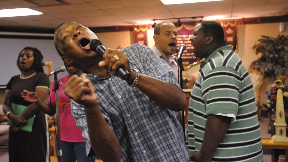 Elder Arlester Washington sang during a rehearsal of the Anointed Central Kentucky Mass Choir. Washington was the founder of the group.