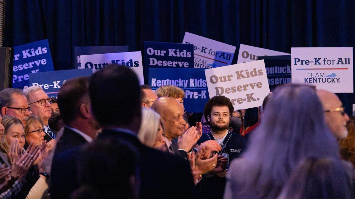 Event attendees holding signs supporting Kentucky Gov. Andy Beshear's stance on “Pre-K for All” during the State of the Commonwealth budget address at the Thomas D. Clark Center for Kentucky History on Jan. 7, 2026, in Frankfort, Ky. 