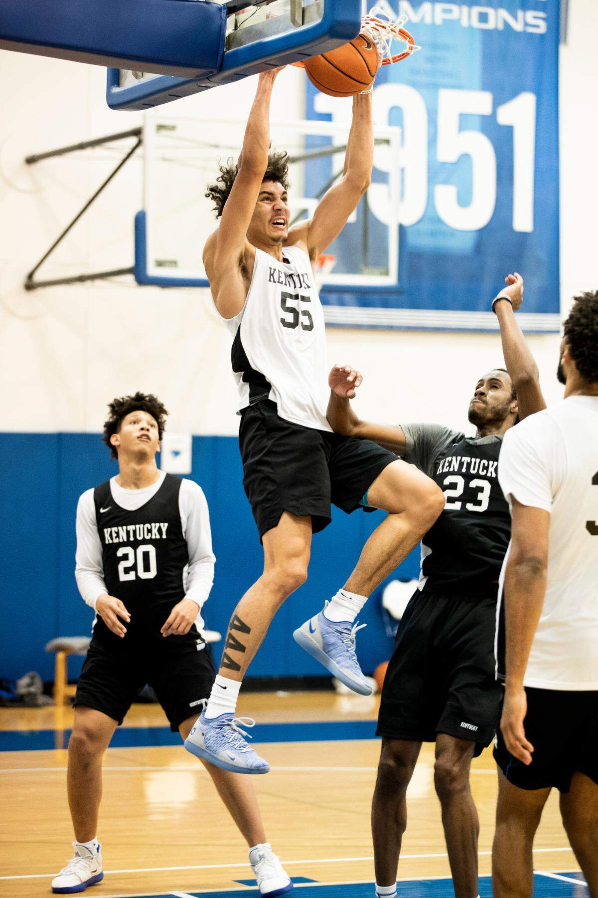 Kentucky freshman Lance Ware (55) dunked during a Wildcats practice. “He’s definitely a tough guy. Loves to compete in the post.” teammate Jacob Toppin said of Ware. “So he’s definitely going to be a big factor. He brings energy not most people bring.”