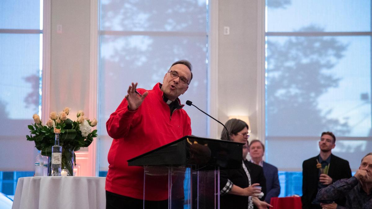 Father Jim Sichko speaks during an announcement event held at the Carrick House in Lexington, Ky., Wednesday, October 20, 2021. Father Jim Sichko announced that his Miss Marie’s Spaghetti Sauce has been picked up by Delta Airlines for use in their overseas flights and their Sky Clubs. Sales of the sauce have raised more than $100,000 for charities in Kentucky and Texas where Sichko’s mother was from.