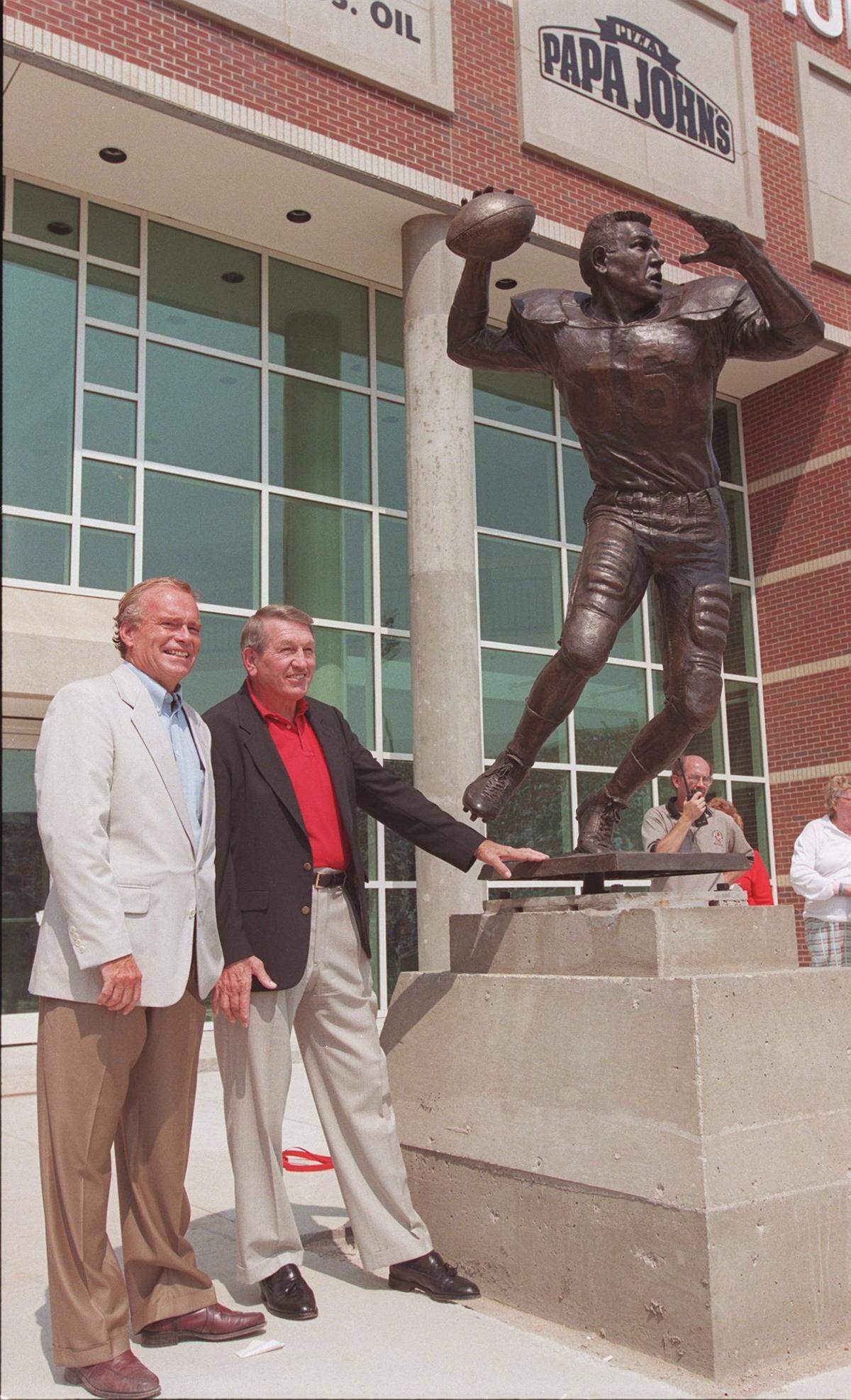 Johnny Unitas, right, posed with the sculptor, Fred Kaail, after the dedication of the Johnny Unitas statue at the University of Louisville’s Cardinal Stadium in 1998. Unitas, who quarterbacked U of L from 1951 through 1954, before becoming an NFL star with the Baltimore Colts, died in 2002.